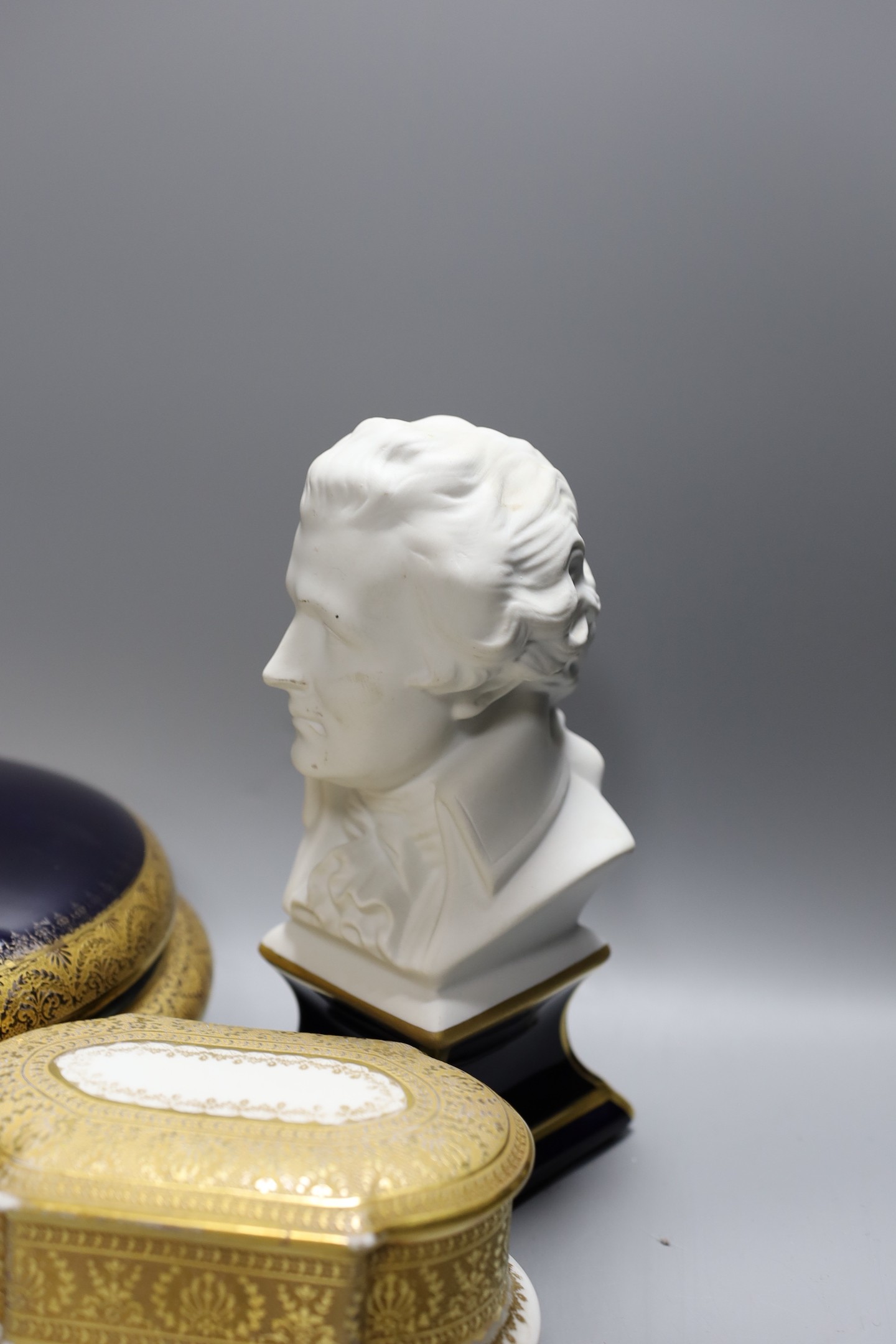 Three Limoges boxes, a bust of Mozart and a bisque two handled vase, Vase 20.5 cms high